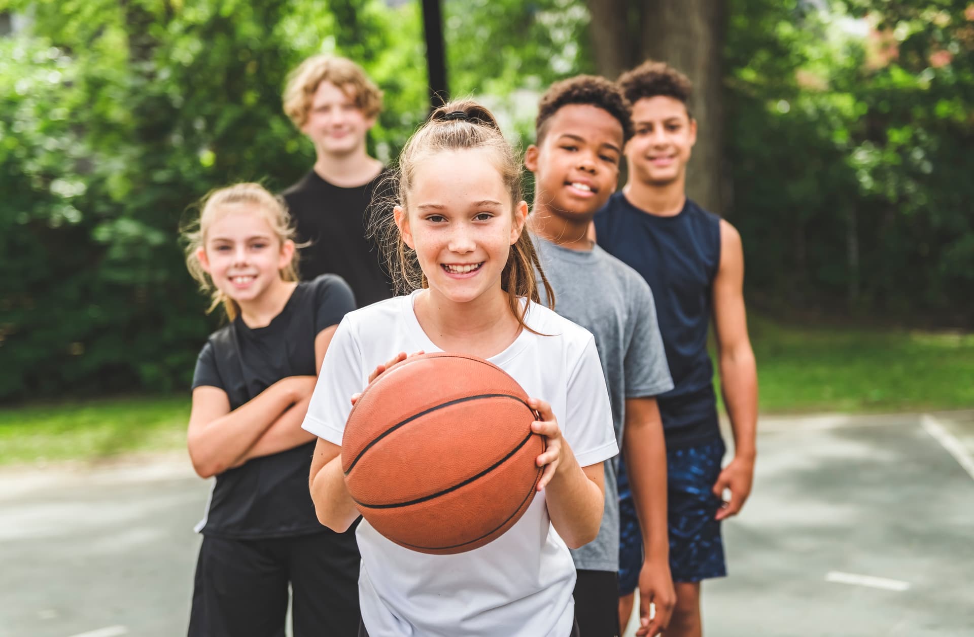happy and confident kids playing sports
