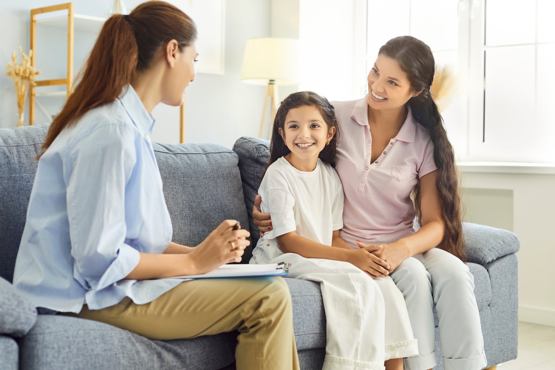 Family navigating Ontario Autism Program registration and next steps with caring professional support