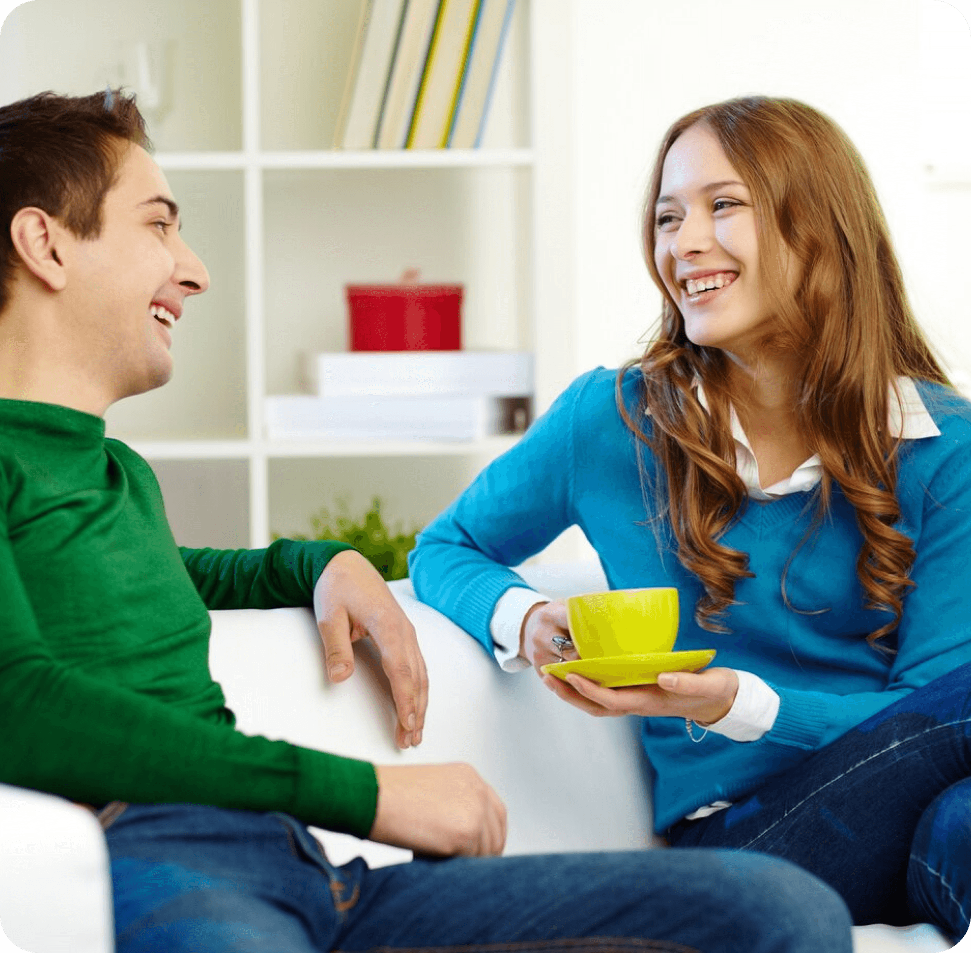 Teens smiling and talking in a cozy room. ACT therapy for anxiety, trauma, and chronic pain in Thornhill, Vaughan, and nearby areas.