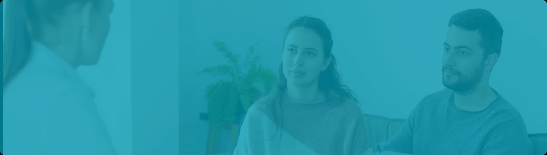 Happy couple in therapy session showing improved communication and connection