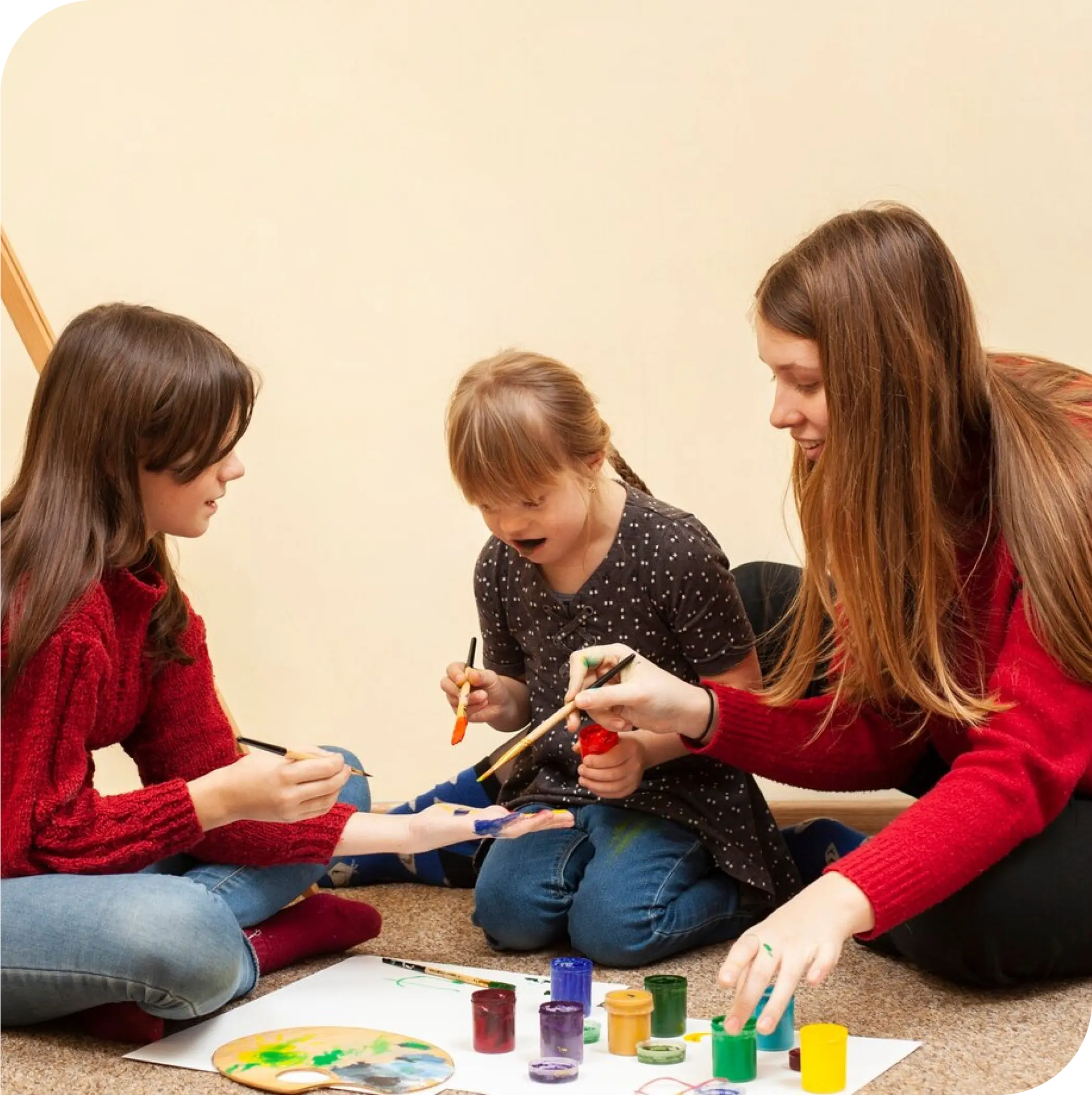 Child engaging in art therapy with therapists, combining CBT techniques for emotional awareness in Thornhill, Vaughan.