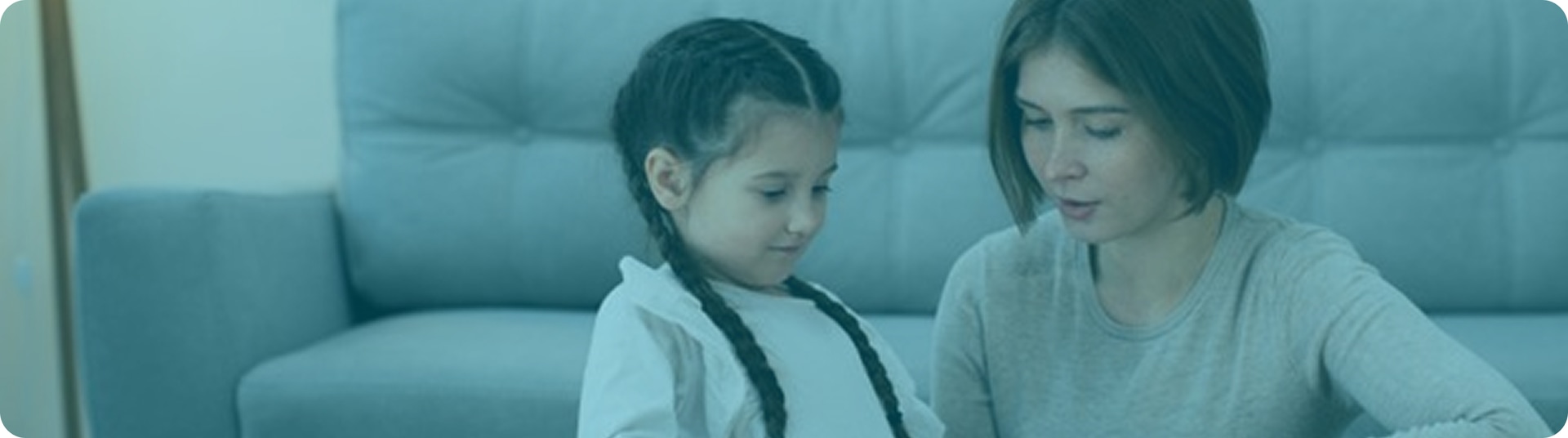 Parent and child talking with a children's mental health professional in Vaughan