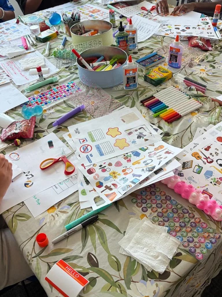 Hands-on back-to-school vision board activity in Thornhill with sticker sheets, goal worksheets, markers, and craft supplies for tweens