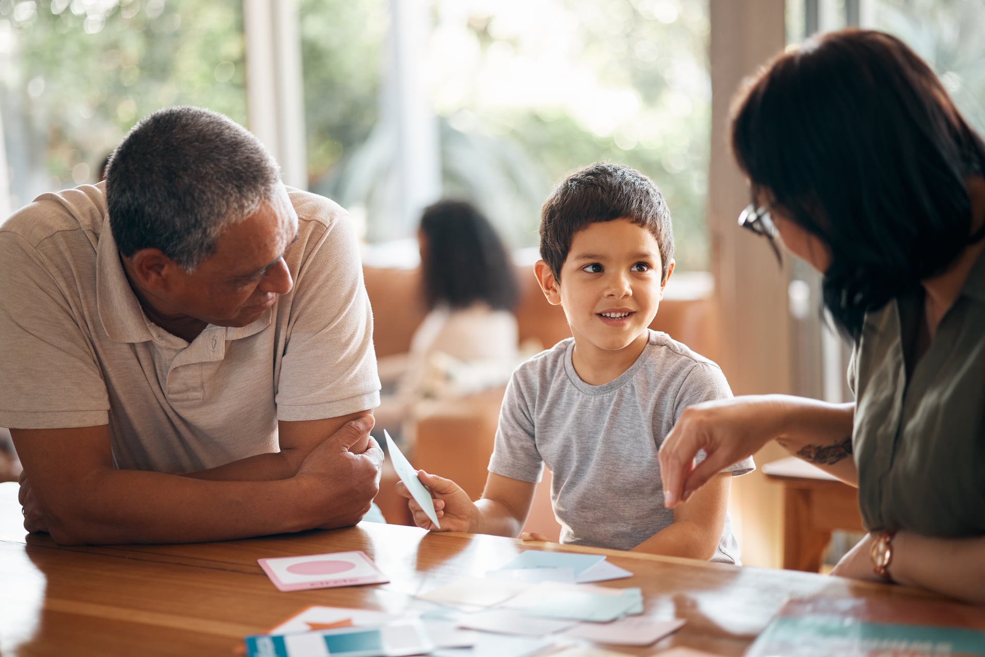 Parent and child communicating positively during family therapy session in Thornhill