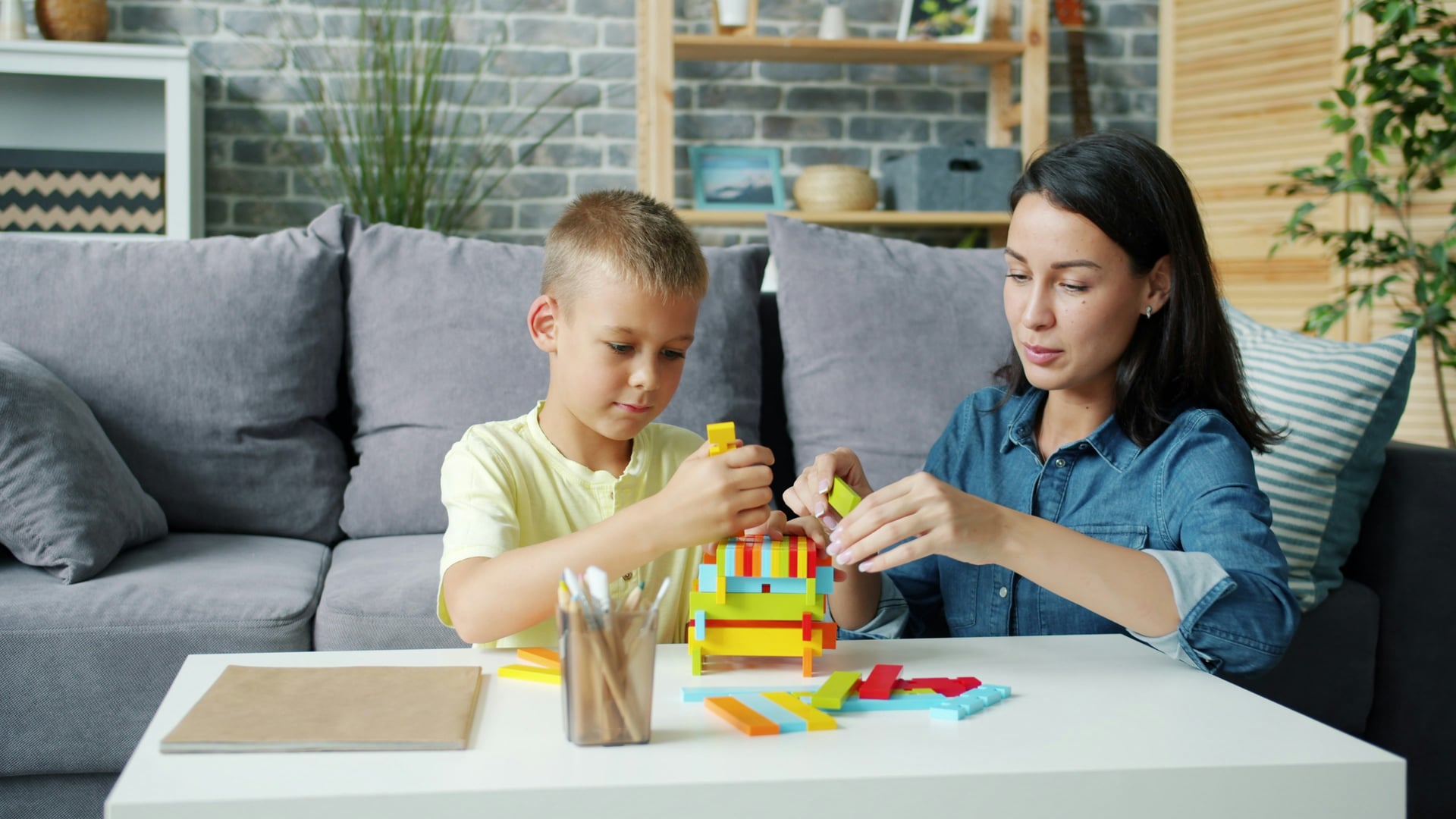 Therapist guiding family members through play-based and evidence-based therapy approaches in Vaughan