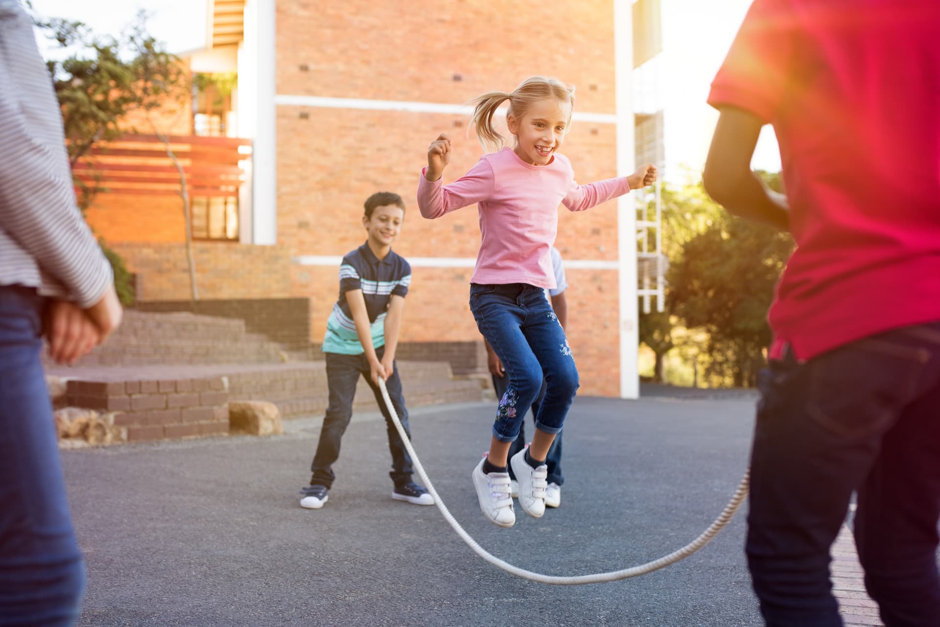 Child skipping after working on gross motor skills with occupational therapy