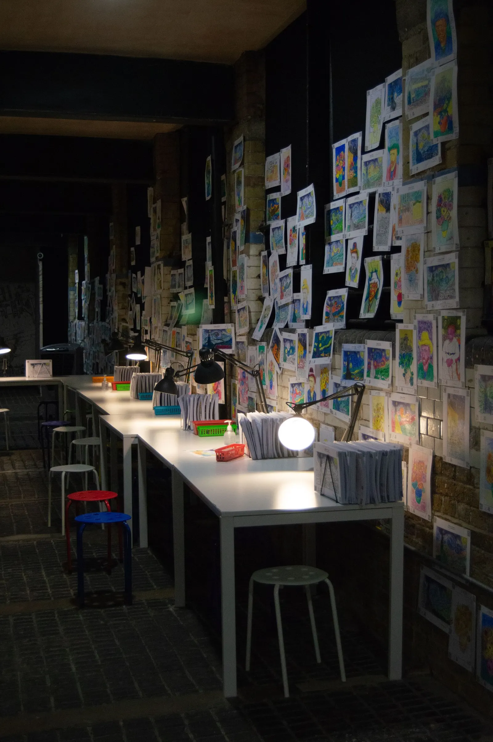 A pile of children's drawings showing why one picture alone cannot reveal what a child is feeling
