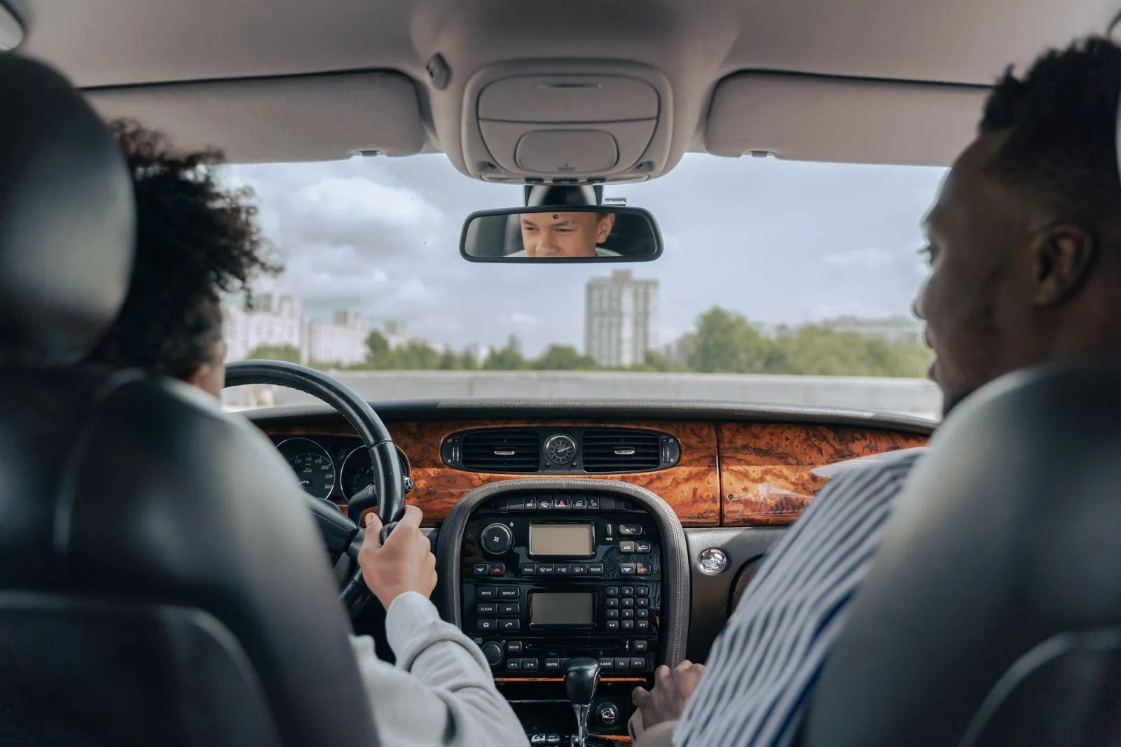 Parent driving with their teen in the passenger seat, a low-pressure setting for hard conversations